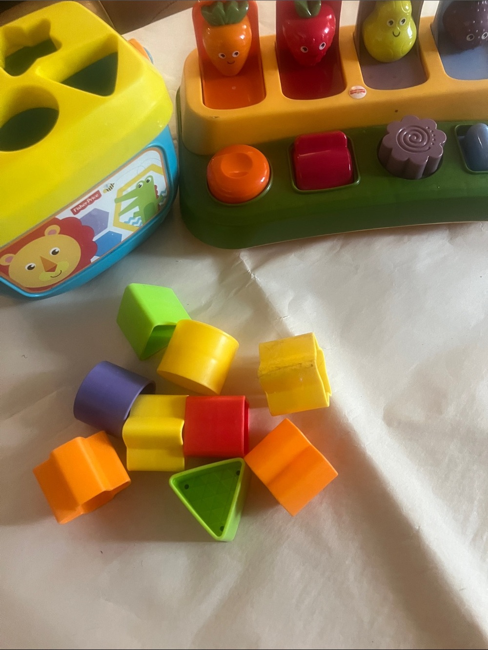 Fisher-Price Yellow and Green Shape Sorter with Colorful Pop-Up Fruit Buttons